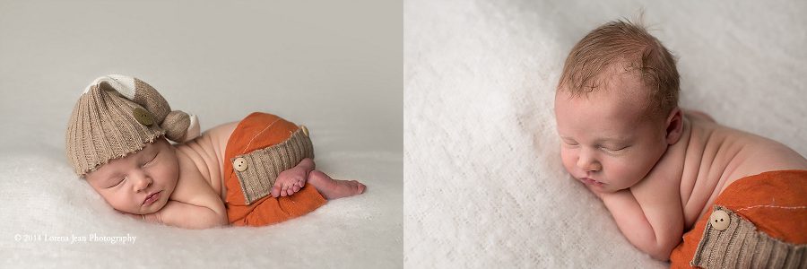 newborn posed on white backdrop with orange pants